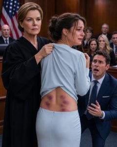 My daughter came home for a quiet visit, but when I stepped into her room and saw her changing, the bruises across her back stopped my breath. “Oh, sweetheart, what happened to you?” I whispered. She grabbed her shirt, trembling. “Please, Mom, don’t. My husband says he’s a lawyer, and no one will believe me.” I straightened, cold as stone. “Then let’s go to court—and see how he dared touch a federal judge’s daughter.”The bruises across my daughter’s back looked like fingerprints left by a monster, and in that instant, the woman who had raised her vanished beneath the judge who had sentenced men for less. Clara saw my face in the mirror and whispered, “Mom, please don’t make this worse.”
She yanked her blouse over her shoulders, but not before I saw the purple bands around her ribs, the healing cut near her spine, and the yellowed marks beneath them—old injuries layered under new ones.
“What happened?”
“I fell.”
“Clara.”
Her mouth trembled. “Daniel gets angry. Then he apologizes. He says I provoke him.”
The hallway outside her childhood bedroom seemed to narrow. Downstairs, rain tapped against the windows of my quiet Virginia home. Clara had arrived that morning with no luggage, no wedding ring, and a smile stretched so tightly it looked painful.
“He says he’s a lawyer,” she continued. “He knows the police. He knows judges. He says no one will believe a nervous wife over a partner at Mercer, Vale and Knox.”
I took her cold hands. “Did he threaten you?”
“He said if I left, he’d prove I was unstable and take Sophie. He’s already drafted custody papers.”
Sophie, my four-year-old granddaughter, was still at preschool near Daniel’s house.
That detail turned my fear into ice.
I had spent twenty-two years watching powerful defendants mistake polished manners for innocence. Daniel’s confidence felt familiar, and so did the fear he exploited so well.
I did not shout. I did not call Daniel. I did not tell Clara that, professionally, I was Judge Evelyn Hart of the United States District Court for the Eastern District of Virginia. Daniel knew me only as Evelyn Cross, Clara’s widowed mother, because I used my maiden name on the bench and guarded my family’s privacy fiercely.
Instead, I said, “We are going to the hospital. Then we are getting Sophie.”
Clara panicked. “He’ll say I kidnapped her.”
“No. We will document everything, follow the law, and leave him no opening.”
At the hospital, a forensic nurse photographed every bruise. Clara disclosed three years of assaults, financial control, forced isolation, and threats. A victim advocate contacted local police and helped file for an emergency protective order.
By sunset, Sophie was released to Clara under police supervision.
At 8:13 p.m., Daniel called.
“You took my daughter,” he said calmly. “Bring her back, Clara, or I’ll destroy you.”
I put the phone on speaker. “Counselor, choose your next words carefully.”
He laughed. “And who are you supposed to be?”
I looked at Clara, then at the recording indicator glowing red.
“The person who just heard you threaten a protected victim,” I said. “Keep talking.”…
PART 2
Daniel arrived the morning in a charcoal suit, carrying a briefcase and the expression of a man entering a room he already owned. Two sheriff’s deputies met him at the gate and handed him the protective order.
He read the first page, smiled, and said, “This will be dissolved by lunch.”
From the porch, Clara flinched. I stood beside her.
Daniel looked me over. “Mrs. Cross, you’re interfering in a marital dispute you don’t understand.”
“I understand evidence.”
“You understand gardening and charity luncheons.”
He turned to Clara. “Come home now. I’ll tell the court this was a misunderstanding.”
Clara’s knees weakened, but she remained upright. “No.”
His smile disappeared. “Then I’ll take Sophie.”
He left without raising his voice, which made him more frightening.
Within hours, Daniel filed an emergency custody petition claiming Clara was delusional, addicted to prescription drugs, and manipulated by her mother. Attached were affidavits from his law partner, his sister, and a therapist Clara had never met.
He had planned this.
But arrogant men mistake preparation for invincibility.
I called a respected family-law attorney from outside my district, disclosed my relationship, and instructed her to keep my office separate. I would not contact the assigned judge, influence the prosecutor, or appear in chambers. My role was mother, witness, and strategist—not weapon.
Clara’s attorney subpoenaed pharmacy records. They showed no addiction. Her medical records documented repeated “falls” and several injuries that had required treatment over time. The therapist’s affidavit collapsed when licensing records revealed he was Daniel’s college roommate and had never evaluated Clara.
Then Clara remembered the cloud account.
Daniel had installed cameras inside their home, supposedly for security. He controlled the password, but Clara had linked the nursery tablet to the account. The archived clips contained no bedroom footage, but the kitchen and hallway recordings were devastating.
In one, Daniel blocked the front door while Clara begged to leave.
In another, he cornered her against a wall and hissed, “No judge will risk humiliating Mercer, Vale and Knox for you.”
The final clip showed his law partner, Gregory Vale, at the kitchen table while Daniel rehearsed a false custody narrative.
“Say she abuses pills,” Vale advised. “Once we get temporary custody, she’ll have no choice but to come back.”
Clara stared at the screen, shaking. “They all knew.”
“Yes,” I said. “And now a grand jury may know too.”
Police referred the recordings to the commonwealth’s attorney. Clara’s lawyer filed them under seal and requested sanctions. The state bar opened an inquiry into Daniel and Vale for fabricating evidence.
Daniel remained smug.
Outside the courthouse before the protective-order hearing, he leaned close. “You think bruises and edited videos will ruin me?”
“No,” I said. “Your choices will.”
He smirked. “You still haven’t told me who you are.”
A court reporter glanced at me, went pale, and whispered, “Good morning, Judge Hart.”
Daniel’s face changed.
For the first time, he understood that he had threatened the wrong family—and confessed his strategy before a federal judge trained to recognize coercion and lies.
Part 3
The hearing room was packed. I sat beside the victim advocate. I requested no special treatment. Judge Marisol Vega disclosed that she knew me professionally but had no personal relationship with me. Both sides waived objection.
Daniel represented himself, believing no attorney could present him better.
He began smoothly. “My wife is fragile. Her mother’s status has transformed a disagreement into a public spectacle.”
“Counsel, the petitioner’s mother has made no filing and contacted no member of this court.”
Daniel pivoted. “The videos are incomplete.”
Clara’s lawyer played them.
The courtroom heard Clara cry out when Daniel slammed her into the hallway wall. It heard Vale invent the addiction claim. It heard Daniel say, “Even if she photographs the bruises, I’ll tell them she did it herself.”
Then the forensic nurse testified. The bruising pattern matched repeated grabbing, impact, and compression—not accidental falls. The physician confirmed old fractures at different stages of healing.
Daniel attacked Clara on cross-examination.
“You stayed with me, didn’t you?”
“Yes.”
“You told friends we were happy.”
“Yes.”
“So either you lied then, or you’re lying now.”
Clara looked directly at him. “I lied then because I was afraid you would kill me.”
The room went silent.
Daniel scoffed. “Dramatic.”
Judge Vega leaned forward. “One more contemptuous remark, Mr. Mercer, and you will answer from a holding cell.”
The judge granted a two-year protective order, temporary sole custody to Clara, supervised visitation after a psychological evaluation, and attorney’s fees. She referred Daniel’s affidavits and statements to prosecutors for possible perjury and obstruction.
He turned toward me. “You did this.”
I stood. “No. You did. I taught my daughter not to confuse confidence with truth.”
His downfall accelerated.
Gregory Vale pleaded guilty to conspiracy to obstruct justice and surrendered his law license. The therapist was charged with filing a false affidavit. Daniel was indicted for assault, witness intimidation, perjury, and unlawful surveillance. His firm removed his name before trial.
The trial lasted four days. Clara testified without looking away. I described only what I had witnessed. The recordings did the rest.
Daniel was convicted on all major counts and sentenced to six years in prison, with suspended time conditioned on treatment and no contact. The state bar disbarred him permanently.
Eight months later, Clara and Sophie moved into a sunlit townhouse. Clara returned to graduate school and trained as a victim advocate. Sophie painted purple flowers on her wall, announcing, “Purple belongs to flowers, not bruises.”
One spring morning, Clara joined me on the courthouse steps. She wore a blue dress with an open back. The scars had faded, but she no longer hid them.
“Were you ever scared?” she asked.
“Terrified.”
“You never looked scared.”
“I’m a judge,” I said. “We learn to let fear sit quietly while truth speaks.”
Clara smiled and slipped her hand into mine.
Daniel once said no one would believe her.
A jury believed her, a court protected her, and she believed herself.
That was the verdict that mattered most.